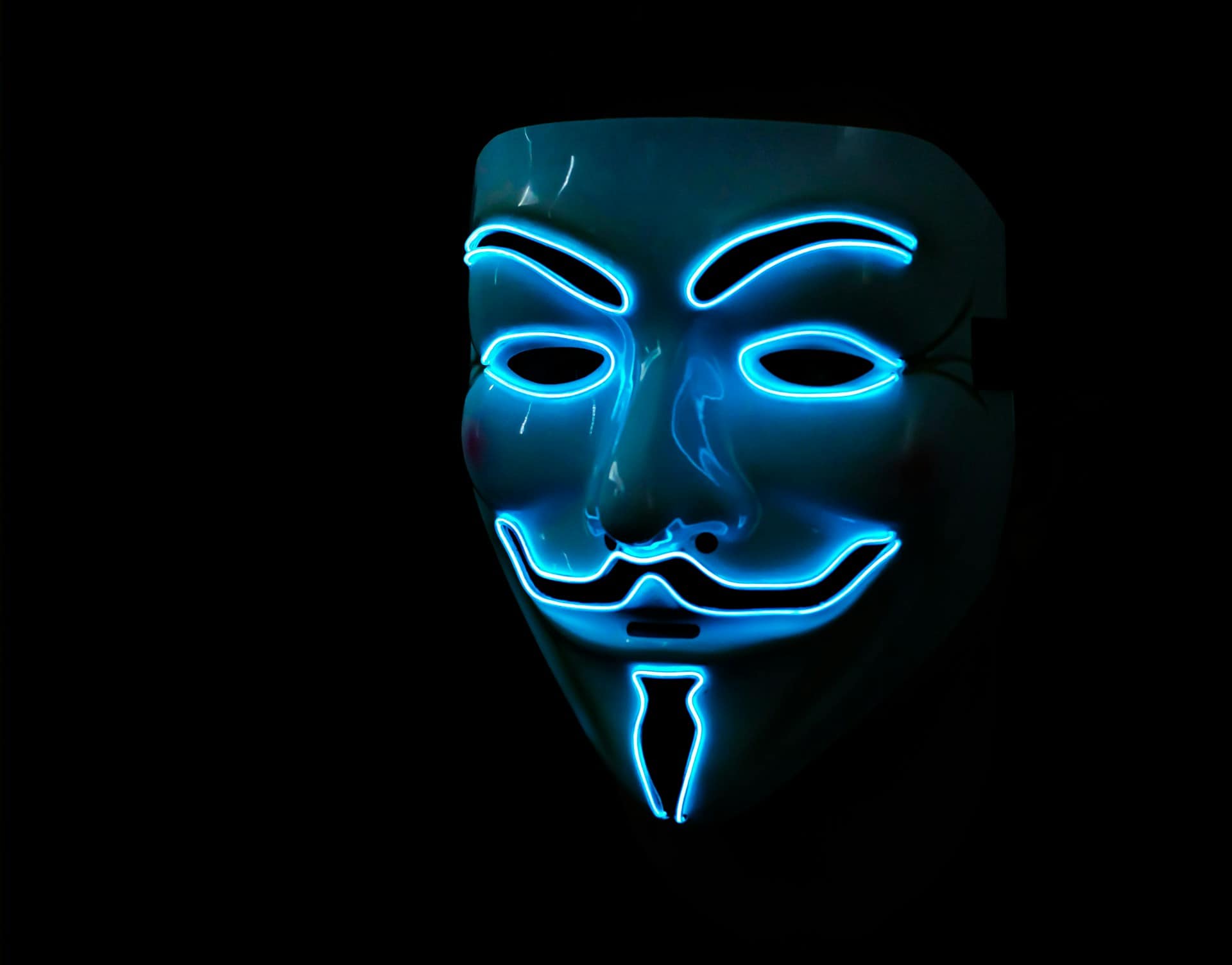 Person wearing a mask symbolizing deceptive strategies in bluffing in Leduc Hold'em by AI